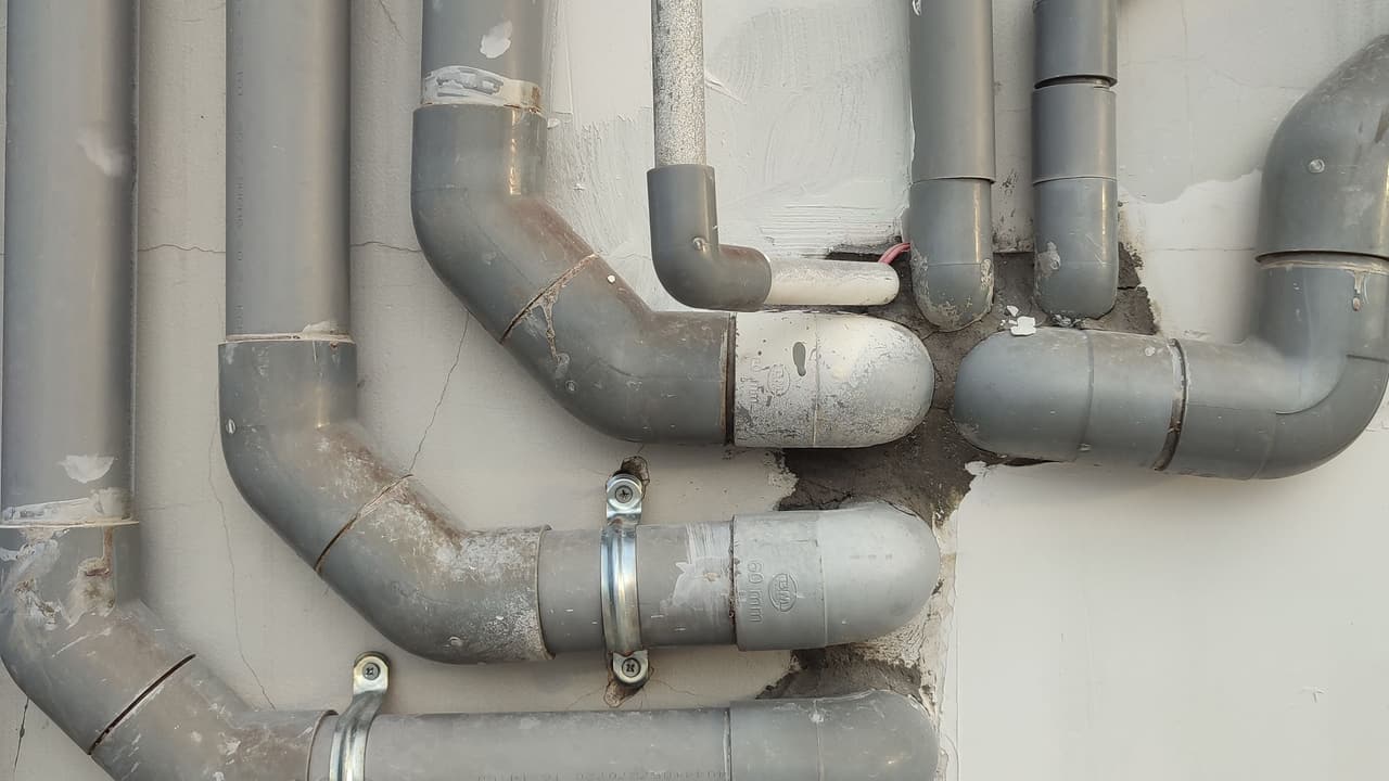 Drain and vent stacks on a building serviced by Advantage Build and Design
